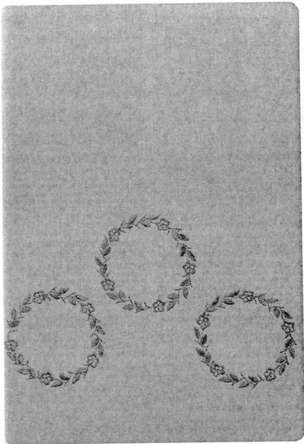 Three ornamental circular frames with floral patterns, arranged in a loose cluster (no text or symbols)