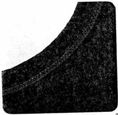 Close-up of a textured, curved surface with no visible text or symbols