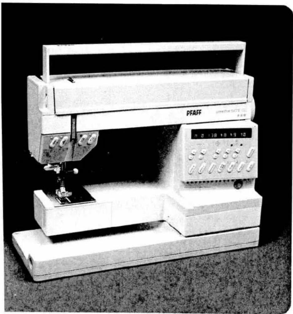 Black-and-white photo of a PFAFF sewing machine with control panel and digital display (no visible text or symbols on device body)