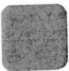 Close-up of a textured gray surface with no visible text, symbols, or markings.