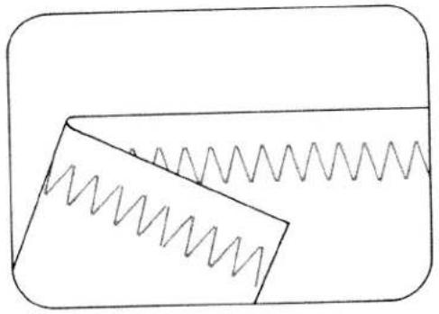 Simple line drawing of a rectangular block with a wavy line and a wavy rectangular block on top, no text or symbols present.