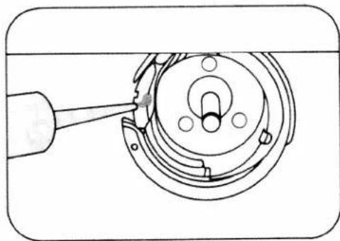 Technical line drawing of a mechanical component with a tool inserted, showing internal components and alignment (no text or symbols)