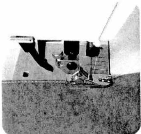 Black-and-white photo of a spacecraft or scientific instrument on a flat surface, no visible text or symbols
