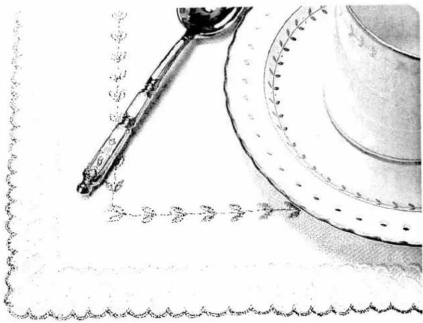 Illustration of a spoon and plate with decorative floral border (no text or symbols)