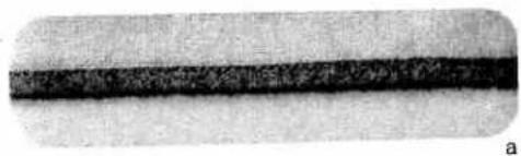 Close-up of a dark horizontal band with textured surface, no visible text or symbols