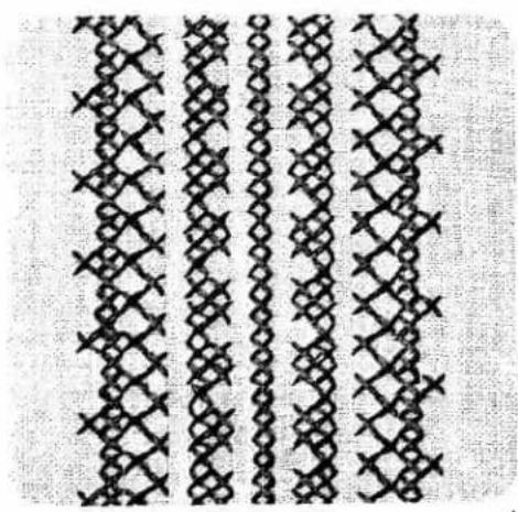 Repeating pattern of interlocking diamond and cross-shaped lines (no text or symbols)