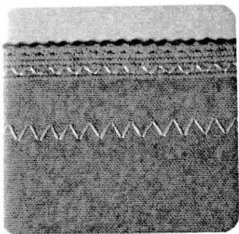 Close-up of a textured fabric with zigzag pattern and layered texture (no text or symbols)