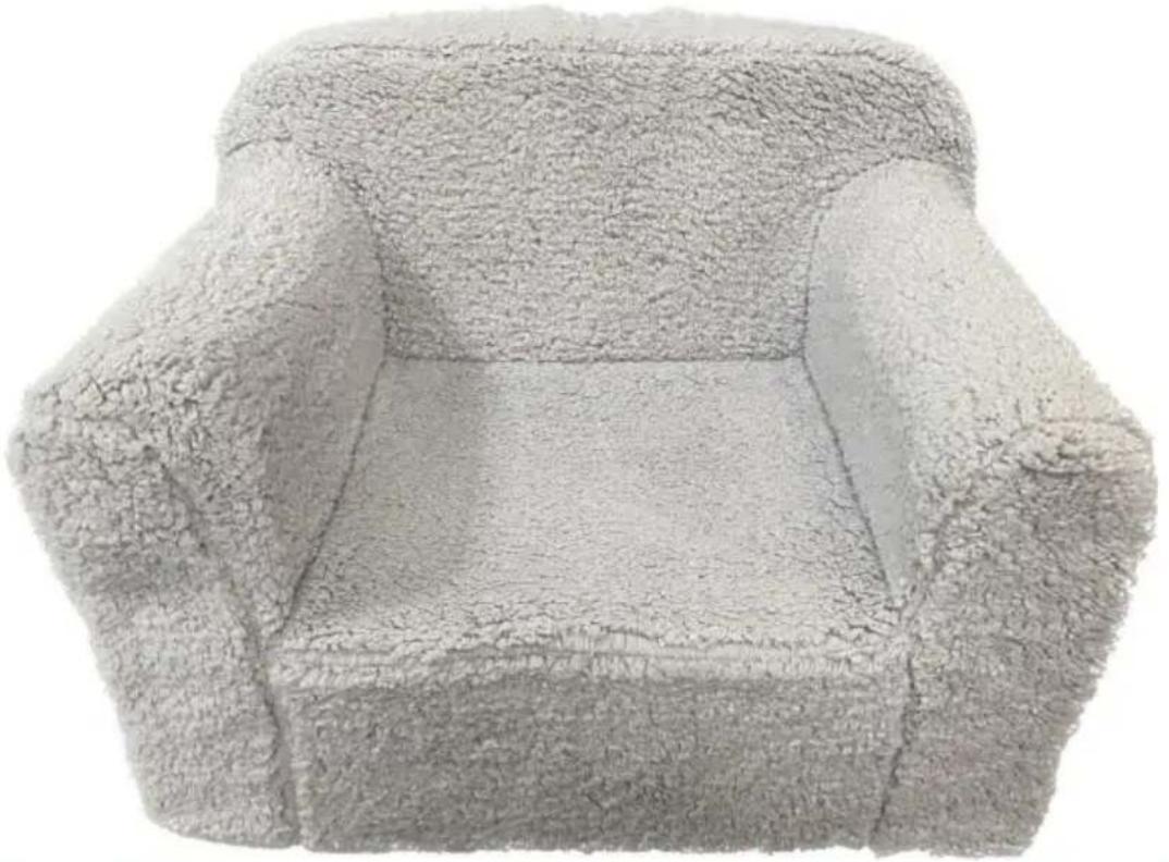 Fuzzy armchair with textured backrest and rectangular seat, no visible text or symbols