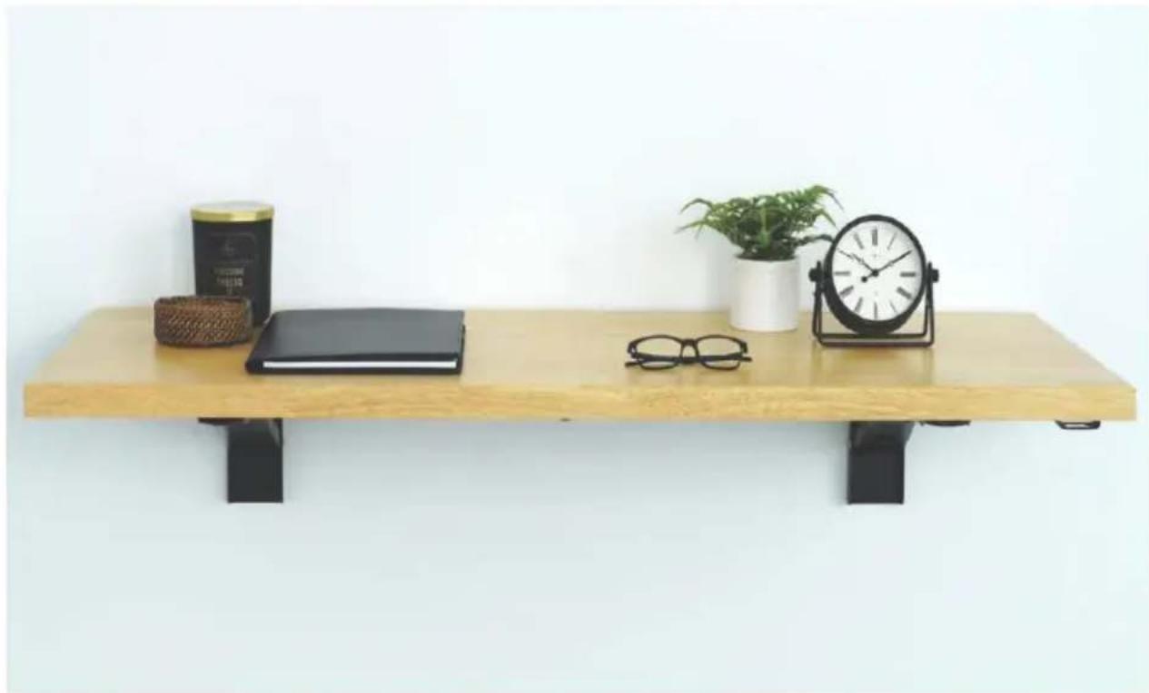 Wooden shelf with black legs, notebook, glasses, and clock on a stand (no text or symbols visible)