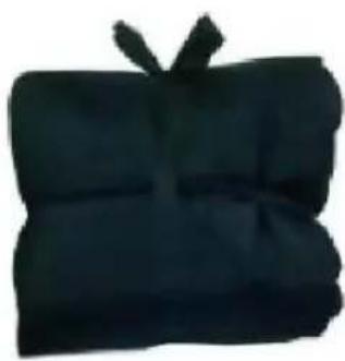 Dark fabric item with ribbon and tie, no visible text or symbols