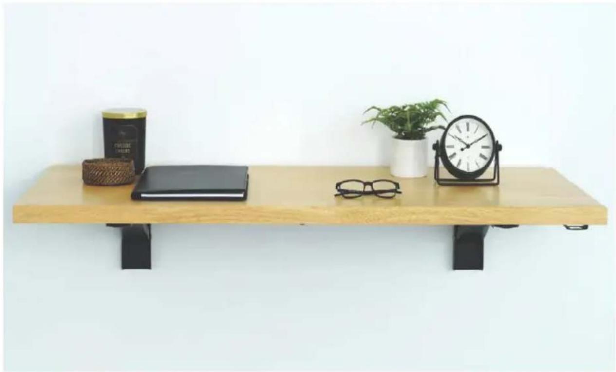 Wooden shelf with black legs, a notebook, glasses, a potted plant, and a clock on top (no text or symbols visible)