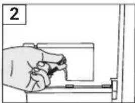 Hand holding a tool interacting with a mechanical component (no text or symbols visible)