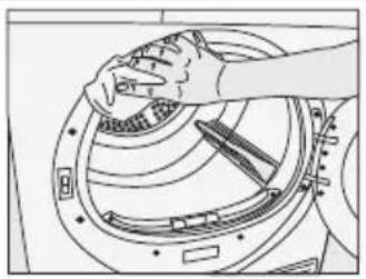 Line drawing of a hand adjusting a circular mechanical component with tools (no text or symbols)