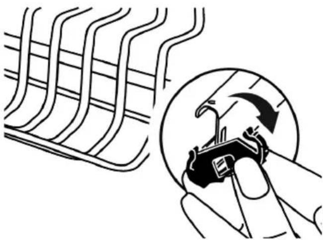 Diagram showing a hand holding a tool interacting with a mechanical component, alongside a grid-like structure (no text or symbols)
