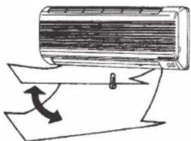 Diagram of a cylindrical object being placed on a sheet with an arrow indicating rotation (no text or symbols present)