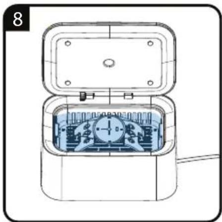 Technical line drawing of an open battery pack with internal circuitry (no text or symbols)