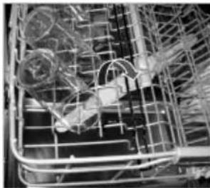 Close-up of a metal basket containing various small objects, possibly laboratory equipment or containers (no visible text or symbols)