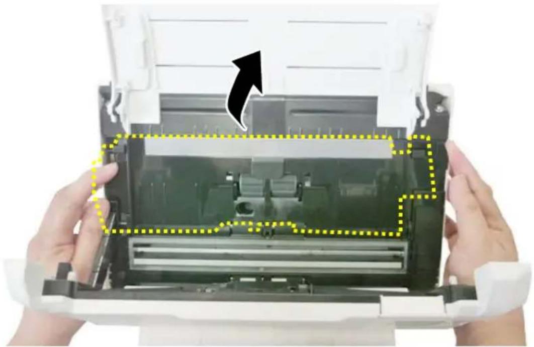 Close-up of hands assembling a device casing with a highlighted internal component (no text or symbols visible)