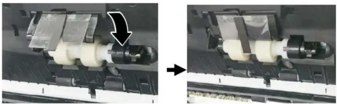 Two views of a mechanical assembly showing a component being processed, with no visible text or symbols.