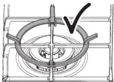 Technical line drawing of a mechanical component with a central circular feature and a checkmark indicating a detail (no text or symbols present)