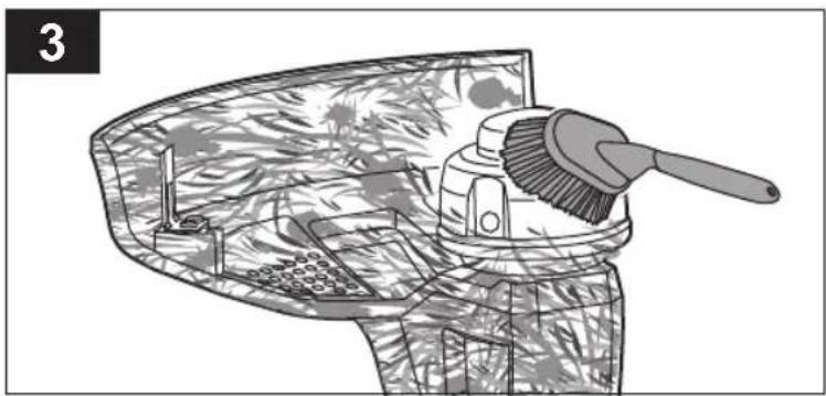 Illustration of a cleaning brush and tool in a mechanical device (no text or symbols)