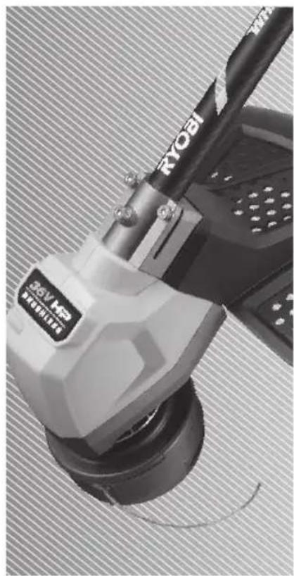 Close-up of a mechanical power tool with visible branding and mesh texture (no readable text or symbols)
