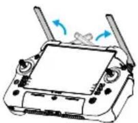 Diagram of a handheld device with two blades and a screen, showing airflow direction (no text or symbols)