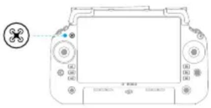 Line drawing of a handheld device with control buttons and a small circular icon (no text or symbols)