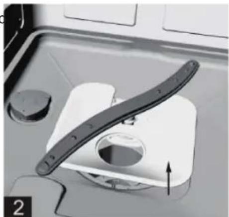 Close-up of a mechanical component with a curved blade and circular opening, no visible text or symbols