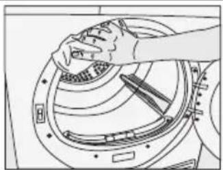 Line drawing of a hand adjusting a circular mechanical component (no text or symbols)