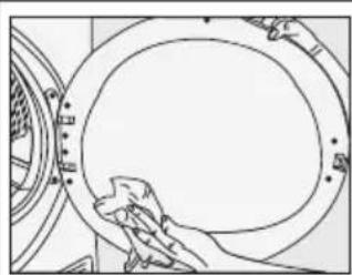 Line drawing of a hand cleaning a circular object with a handle (no text or symbols)