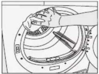Line drawing of a hand adjusting a circular mechanical component with tools (no text or symbols)