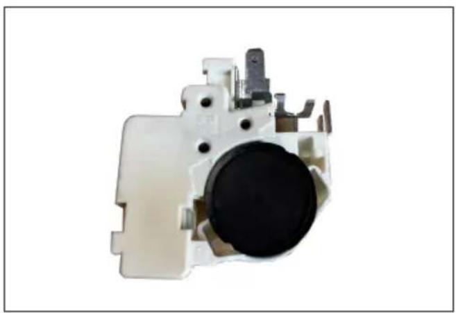 Close-up of a mechanical component with a black circular body and metallic fittings (no visible text or symbols)