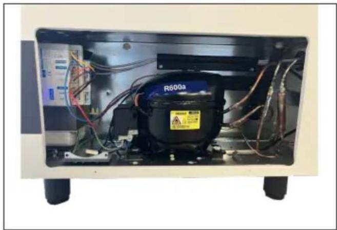 Interior view of an electronic device showing internal components and wiring (no readable text or symbols)