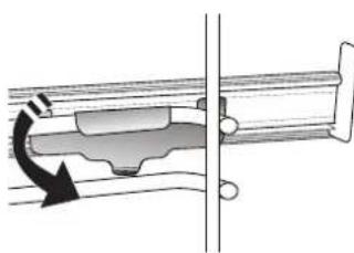 Mechanical assembly diagram showing a rotating component with a curved arrow indicating motion (no text or symbols)