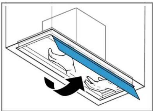 Diagram showing hands opening a blue object into a rectangular frame, with an arrow indicating direction (no text or symbols)