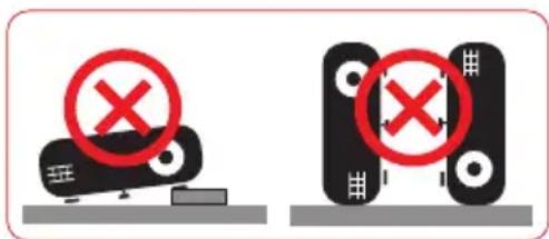 Two diagrams showing a computer monitor with a red X mark and a black device, both marked with red circles indicating prohibition or cancellation.