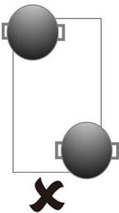 Simple diagram with two gray spheres and a black X symbol at the bottom (no text or labels)