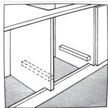 Simple line drawing of a cabinet or shelf with two horizontal bars and one dashed-line component (no text or symbols)
