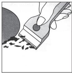 Illustration of a hand using a tool to brush or paint over small particles (no text or symbols)