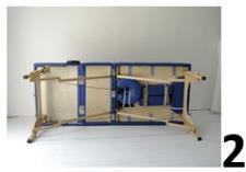 Exterior view of a blue and beige modular device with wooden frame structure (no text or symbols visible)
