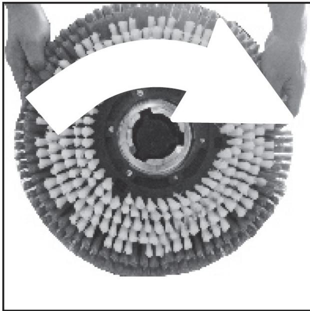 Close-up of a mechanical component with evenly spaced teeth and central bore, no visible text or symbols