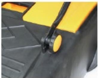 Close-up of a mechanical component with yellow and black parts, no visible text or symbols