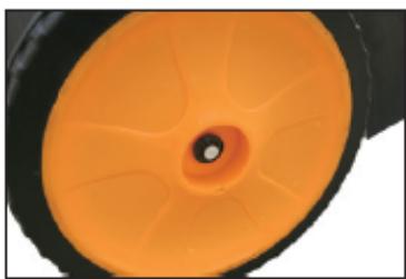 Close-up of a mechanical component with orange and black surfaces, no visible text or symbols