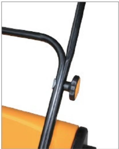 Close-up of a yellow tractor's wheel and handle (no visible text or symbols)