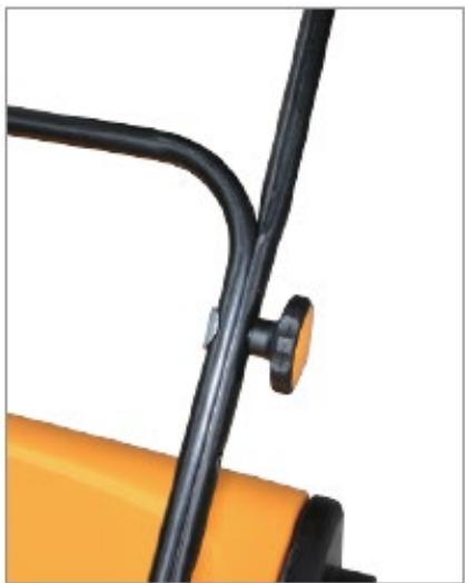 Close-up of a yellow tractor's wheel and handle (no visible text or symbols)