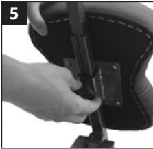 Close-up of a hand using a tool to adjust or install a dark mechanical component (no visible text or symbols)