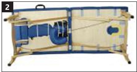 Interior view of a flatbed folding chair with blue walls, wooden frame, and internal compartments (no text or symbols visible)