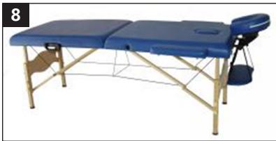 Blue medical table with adjustable armrest and backrest, no visible text or symbols
