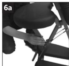 Close-up of a person seated on a chair with hands adjusting the seat (no visible text or symbols)
